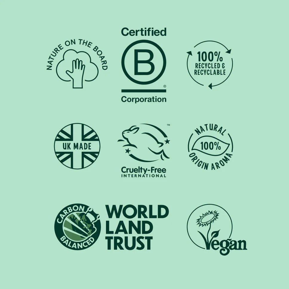Collection of green and black certification logos on a green background