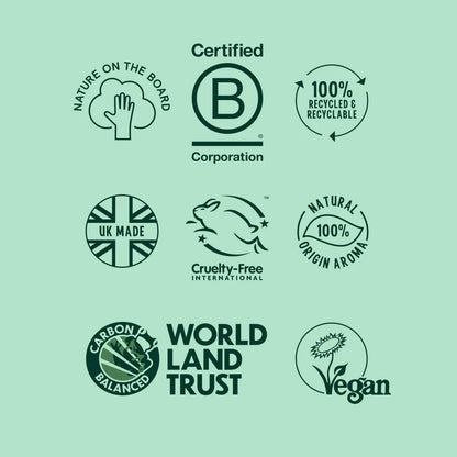Collection of green and black certification logos on a green background