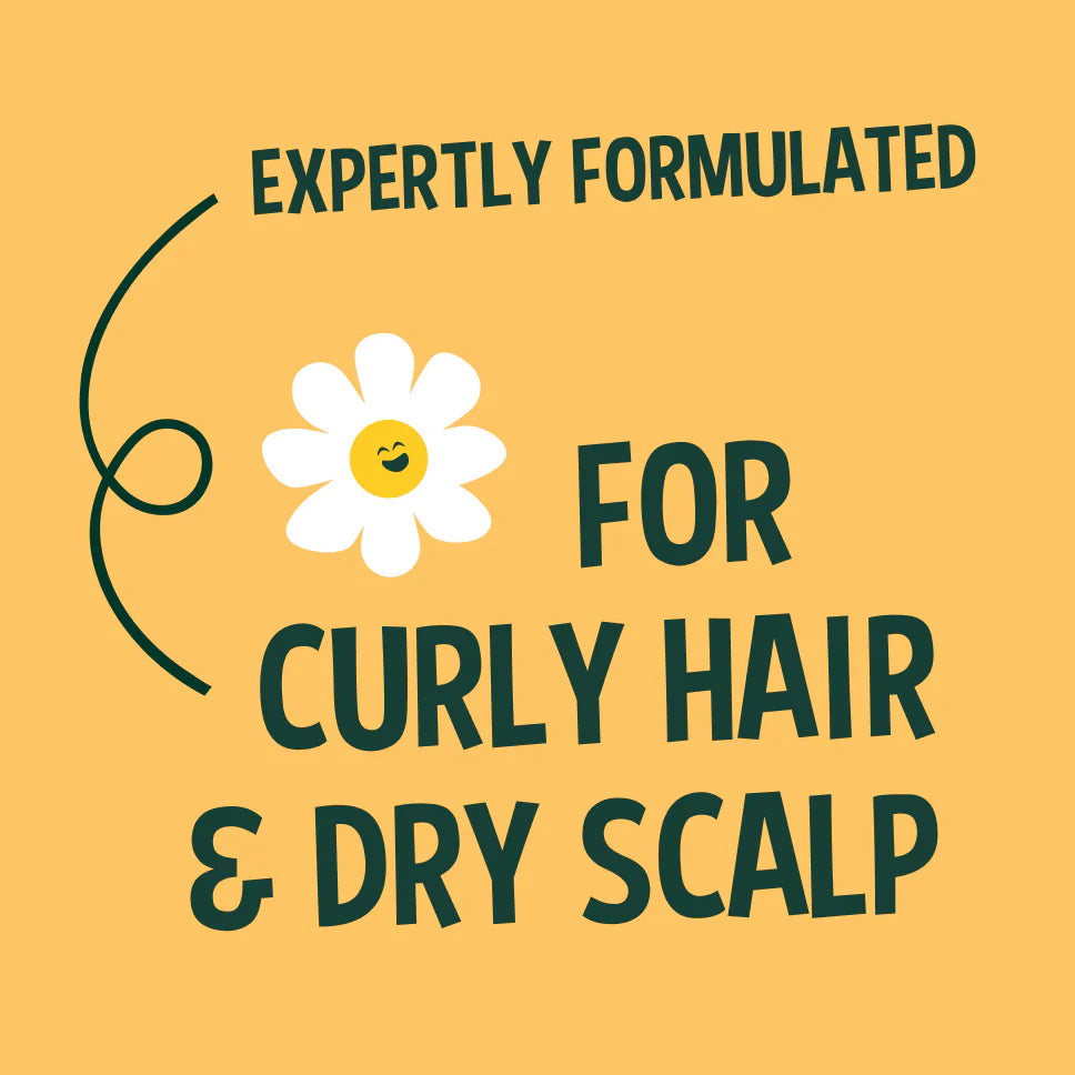 Product label for curly hair and dry scalp treatment with a daisy graphic on a yellow background.