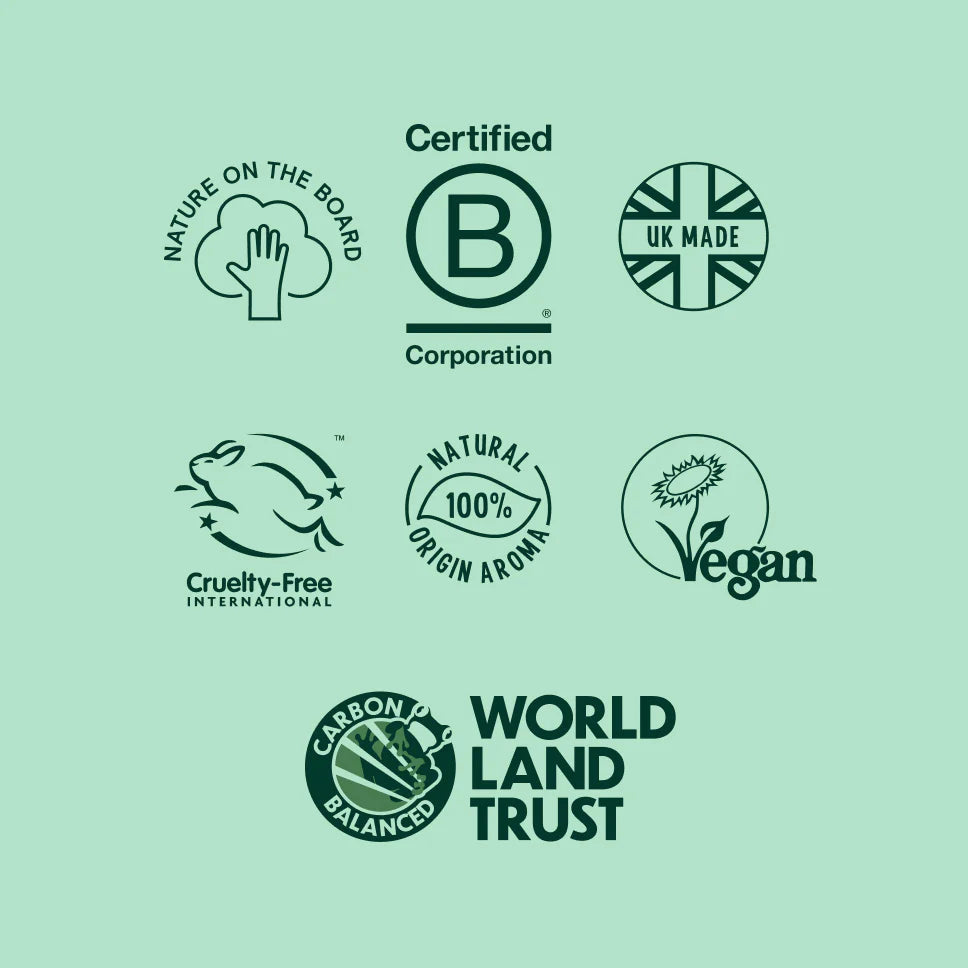 Collection of green certification logos on a light green background
