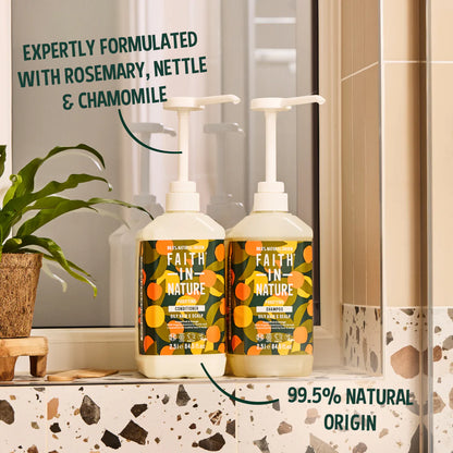 Two bottles of 'Faith In Nature' products on a bathroom counter with text about ingredients and natural origin.