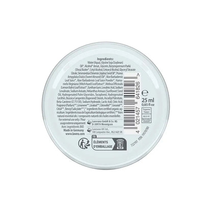 Back label of a cosmetic container with text and barcodes on a white background